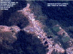 Aerial photograph of a Mihanda, Zaire refugee camp in 1996. Pictured are 500+ tents set up in the Mitumba Mountains.