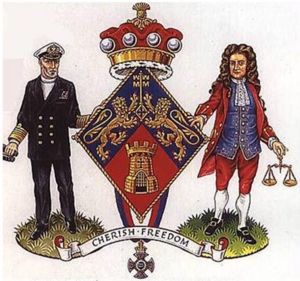 The arms of Baroness Thatcher of Kesteven are shown on a lozenge. This is the traditional shape used by a  woman for her coats of arms.