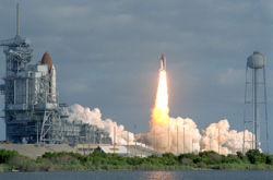 Shuttle mission STS-31 lifts off, carrying Hubble into orbit.