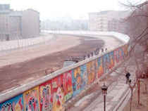 The Berlin Wall in 1986, brightly painted on the western side. Those trying to cross the so-called death strip on the eastern side were at risk of being shot.