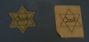 Yellow stars of the type that all Jews were required to wear during the Nazi occupation.