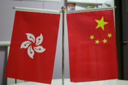 The HKSAR and the PRC desktop flags, both with the dimension of 15�×�10 in centimetre.