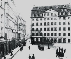 A photograph of the outside of Bach’s apartment at the end of the St Thomas School, taken before its demolition in 1902. Three steps can be seen leading to the front door.