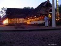 Most larger Keralite Hindu temples have outer walls affixed with arrays of oil lamps, which devotees light as part of their evening prayers.