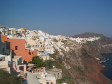 The rugged coastline of the volcanic island of Santorini.