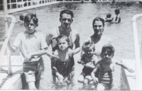 With his parents and siblings in 1936