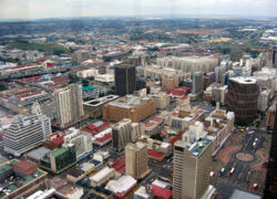 Marshalltown, as seen from the top of the Carlton Centre. The M1 and M2 run behind the buildings, and the southern suburbs extend past the highway boundary.