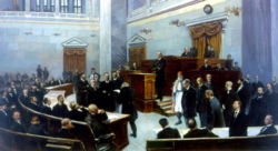 The Hellenic Parliament, covening as Charilaos Trikoupis gives a speech, during the late 19th century.