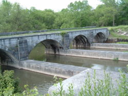 Derelict aqueduct over Nine Mile Creek north of Camillus, New York, built in 1841 and abandoned c. 1918, one of 32 aqueducts on the Erie Canal.