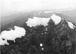 Puncak Jaya glaciers 1972. Left to right: Northwall Firn, Meren Glacier, and Carstensz Glacier. USGS. Also mid 2005 image and animation. 