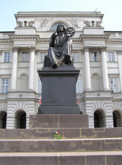 Statue of a seated Copernicus holding a armillary sphere, by Bertel Thorvaldsen, in front of the Polish Academy of Sciences, Warsaw.