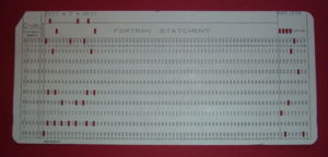 A 1970s punched card containing one line from a FORTRAN program. The card reads: "Z(1) = Y + W(1)" and is labelled "PROJ039" for identification purposes.