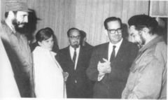 Guevara with members of his "reception committee" at Havana airport�(Havana - 14 March 1965)