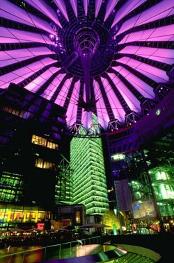 Berlin's Sony Center reflects the global reach of a Japanese corporation. Cyberpunk is often set in urbanized, artificial landscapes, and "city lights at night" was one of the genre's first metaphors for cyberspace (Neuromancer).