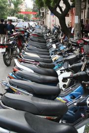 Motor scooters dominate the roads in the Old Quarter