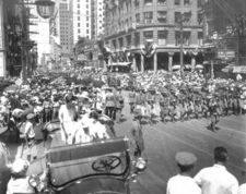 A parade down Main Street c. 1920