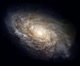 NGC 4414, a typical spiral galaxy in the constellation Coma Berenices, is about 56,000 light years in diameter and approximately 60 million light years distant.