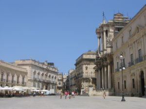 Illustration 8: Piazza del Duomo, Syracuse. Andrea Palma's Cathedral (Illustration below); the pillared cathedral is flanked by Baroque palazzi.