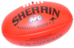 An Australian football. The Sherrin brand is used for all official AFL matches.  A red ball like this is used for day matches and a yellow ball is used for night matches.