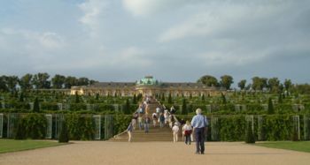 The south facing garden façade.  Frederick the Great ignored his architect's advice to place the piano nobile upon a low ground floor. As a result, the palace failed to take maximum advantage of its location. Its windows are devoid of views, and seen from its lower terraces it appears to be more of an orangery than a palace.