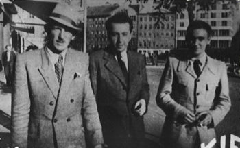 Bratislava, June-July 1944. Vrba on the right, and on the left, Arnost Rosin, who escaped from Auschwitz on May 24, 1944. The man in the middle is Josef Weiss, who worked for the Bratislava Ministry of Health. He secretly made copies of the Vrba-Wetzler report, which the escapees kept hidden behind a picture of the Virgin Mary in an apartment they were renting. 