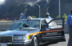 Lloyd England's taxicab was hit by a lightpole as American Airlines Flight 77 passed over Washington Boulevard and crashed into the Pentagon.