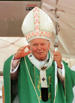 Pope John Paul II blessing faithful while visiting Brazil in 1997.