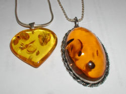 Amber jewellery in the form of pendants. Amber is the solidified resin of an ancient pine tree.