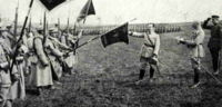 General Józef Haller (touching the flag) and his Blue Army.