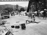 Royal Engineers prepare to blow up a bridge during the retreat.