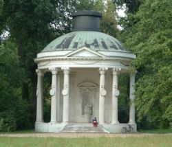 The Temple of Friendship: constructed south of the main avenue from 1768 to 1770 by Carl von Gontard in memory of Frederick the Great's  favourite sister, Margravine Wilhelmine of Bayreuth.  The building complements the Antique Temple, which lies due north of the alley.