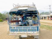 Songthaews are pick-up trucks with benches. They are used for long-distance and local public transport.