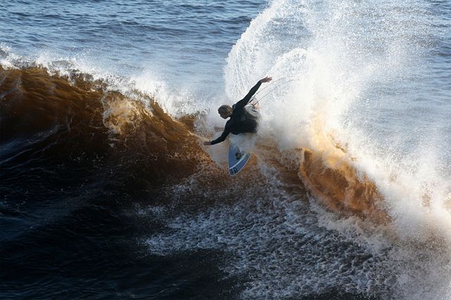 Image:A surfer at the wave.jpg