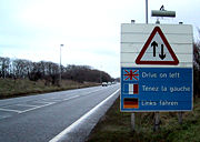 One of many road signs in the English county of Kent placed on the right hand side of the road