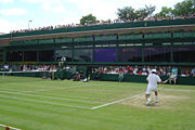 S�bastien Grosjean takes a shot on Court 18 during the 2004 championships