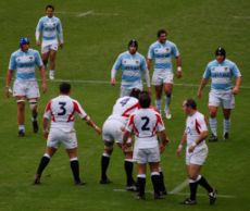 England (white) playing Argentina (blue) at Twickenham.