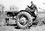 The classic Row Crop tractor (an Allis-Chalmers WD). Note the absence of any rollover protection system.