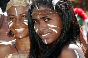 Dominican girls at carnival in Ta�no garments and makeup (2005).