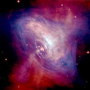 This composite image shows X-ray (blue) and optical (red) radiation from the Crab Nebula's core region. A pulsar near the center is propelling particles to almost the speed of light. This neutron star is travelling at an estimated 375�km/s. NASA/CXC/HST/ASU/J. Hester et al. image credit.