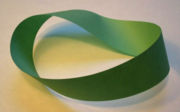 A M�bius strip, an object with only one surface and one edge; such shapes are an object of study in topology.