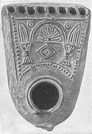 Hanukkah lamp unearthed near Jerusalem, c. 1900.