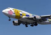 The ANA Boeing 747-400 airplane painted with Pikachu and other Pok�mon.