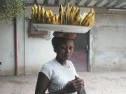 Woman carrying bananas