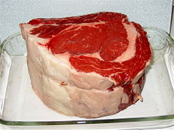 An uncooked rib roast