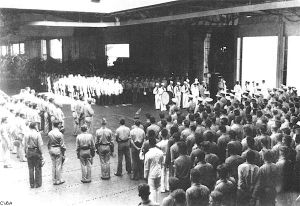 The crew of Enterprise conducts a burial-at-sea on October 27 for 44 of their fellow crewmen killed during the battle the day before.