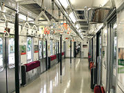 Interior of a 6 door passenger car in Japan, when the bench seats are folded