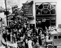 Crowd at New York's American Union Bank during a bank run early in the Great Depression.