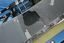 A mock-up of a space shuttle leading edge made with an RCC-panel taken from Discovery. Reproduction of the conditions of the foam impact on Columbia's final launch, showed brittle failure of RCC.