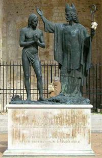 Statue in the Cathedral of Reims depicting the baptism of Clovis I by Saint Remi there around 496.