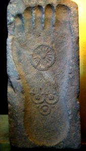 Footprint of the Buddha with Dharmachakra and triratna, 1st century CE, Gandhāra.